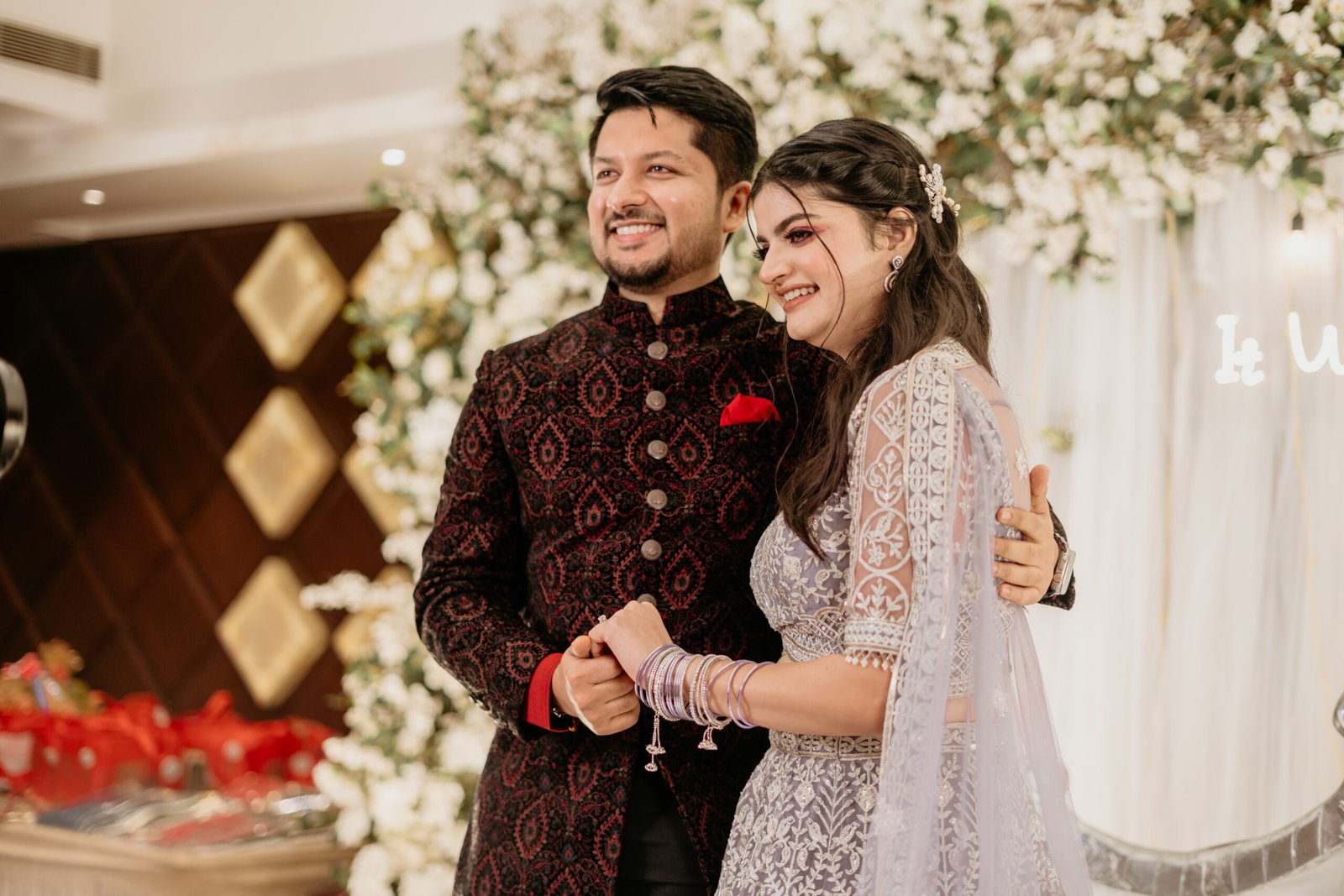 The groom getting ready for the wedding day, captured by Mohey Rang Films in detailed and stylish wedding photographs.