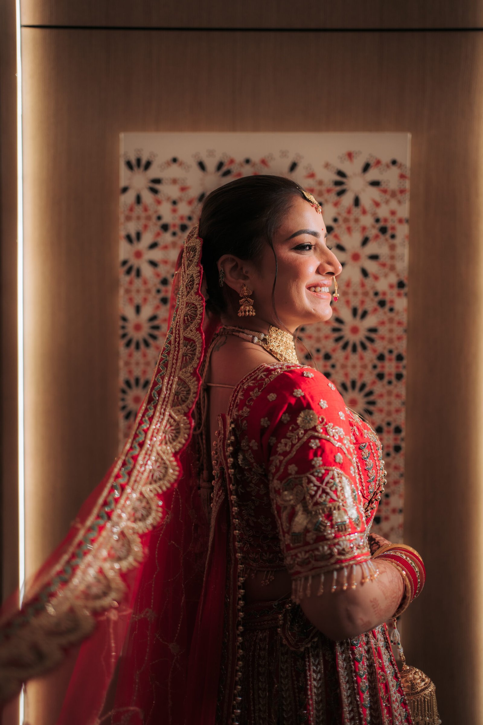 Groom posing outdoors in natural light, captured beautifully as wedding photographs by Mohey Rang Films